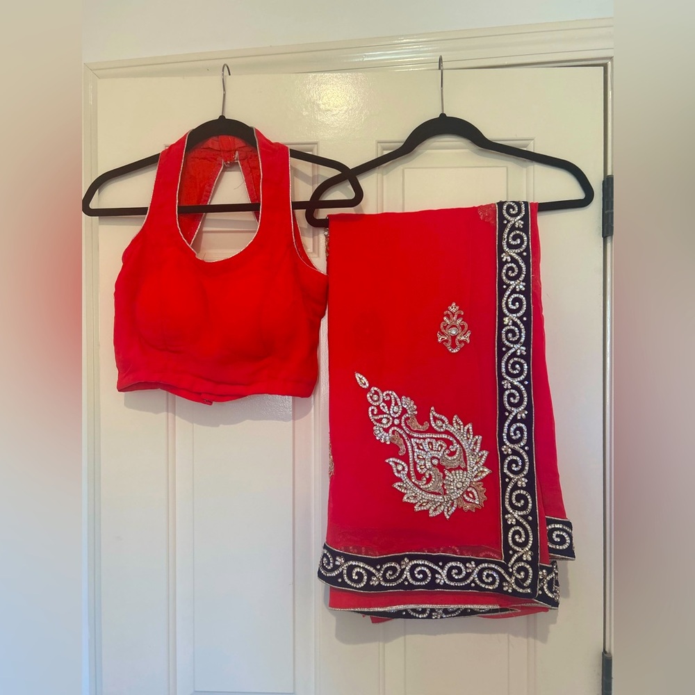 Coral pink Saree. Rhinestone work with velvet border.